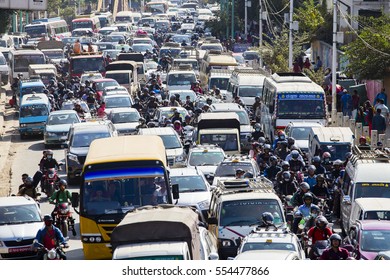 KATHMANDU, NEPAL - OCTOBER 25, 2016 : Traffic moves slowly along a busy road in Kathmandu, Nepal. Crowded traffic jam road in city