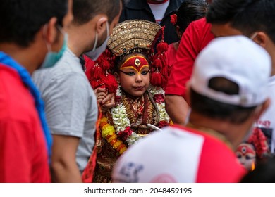 Kathmandu, Nepal - September 2021: The living goddess Kumari during the annual Indra Jatra festival in Durbar Square on September 24, 2021 in Kathmandu, Nepal.