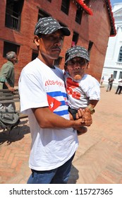 KATHMANDU - SEP 28: Chandra Bahadur Dangi Visits Durbar Square On September 28, 2012 In Kathmandu, Nepal. Dangi Is The World's Shortest Man Alive (54.6 Cm) - According To The Guinness Book Of Records.