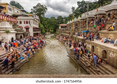 Kathmandu,Nepal - August 14,2019: Crowd of Hindu Prayers during Janai Purnima Rakshya Bandhan Festival in Pashupatinath Temple Premises,KKathmandu.
