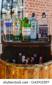 Kathmandu,Nepal - Dec 16,2017: Different Brands Of Booze, Liquor, Or Alcohol In A Bar Or Tavern. Multiple Bottles Of Adult Beverages  At Bar, Line Of Liquor Bottles