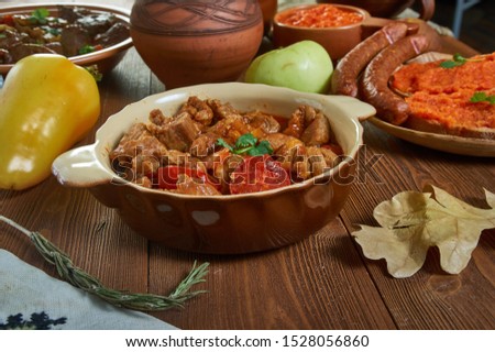 Katino Meze, pork and veal that are fried in oil with leeks, peppers. Bulgarian  national  cuisine, Traditional assorted Balkans dishes, Top view.