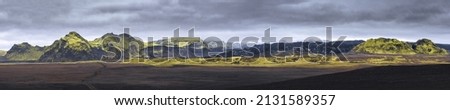 katla region Iceland, wide panorama of glacier and green mossy mountains