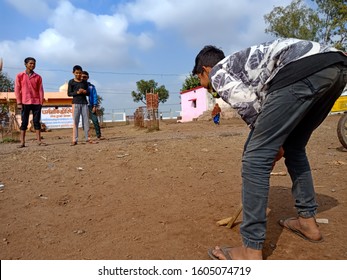 Katni, INDIA - January 1, 2019: Indian Village Local Childrens Plying Gilli Danda At Beautiful Environmental Background 