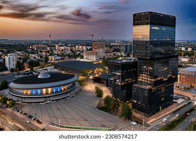 Katowice centre and office towers buildings and Spodek at evening