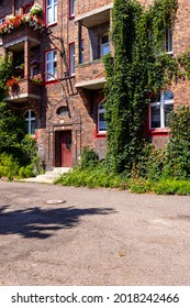 Katowice, Nikiszowiec, Poland - July 29, 2021 : Historic Housing Estate For Coal Miners From The Beginning Of The 20th Century. Built As A District Of Katowice Of Red Brick