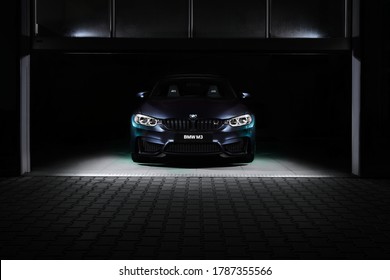 Katowice / Poland - 12/03/2016: The front of the BMW M3 30 Jahre Edition standing in a dark garage. This is a limited edition created to celebrate the 30th anniversary of the M3. 500 pcs only, 450 hp.