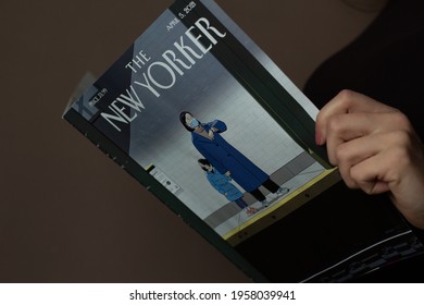 Katowice, Poland – April 17, 2021: A Woman Is Reading The New Yorker Magazine.