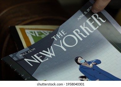 Katowice, Poland – April 17, 2021: Closeup Of A Person Opening The New Yorker Magazine.