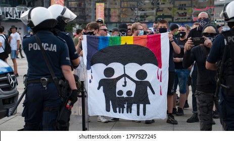 KATOWICE, Poland - August 10, 2020: The Struggle For LGBT Equality. Pride Meets Prejudice In Poland. Group Of Traditionalists Fighting Against LGBT.  Demonstration During Coronavirus Pandemic.