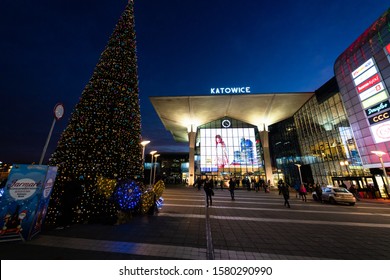 KATOWICE, POLAND - DEC 4, 2019: Katowice main railway station entrance with Christmas tree in the foreground. - Shutterstock ID 1580290990