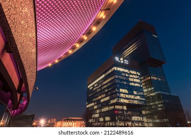Katowice, Poland - february 02 2022: 
Katowice at night. A view of the modern KTW office building and the Spodek sports and entertainment hall
