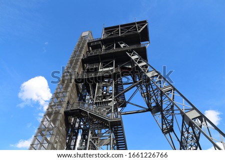 Katowice, Poland - retro industrial coal mine shaft tower. Upper Silesia region.