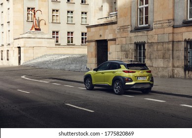 Katowice/Poland -02.16.2020: Hybrid Hyundai Kona parked next to the modernist Voivodship Office building. The total power of the gasoline and electric engine is 141hp.