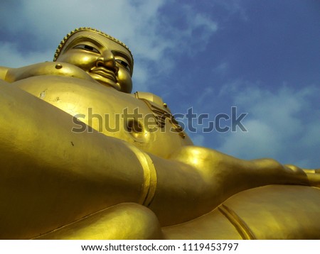 Katyayana (Buddhist): This is the Buddha's disciple. The fat belly is a means to abundance fortune. Is a religious culpture.