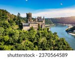 Katz castle and romantic Rhine in summer at sunset, Germany. Katz Castle or Burg Katz is a castle ruin above the St. Goarshausen town in Rhineland-Palatinate region, Germany