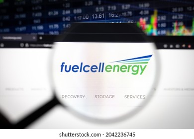 KAUFBEUREN, GERMANY - JUNE 12, 2021: Fuelcell Energy Company Logo On A Website With Blurry Stock Market Developments In The Background, Seen On A Computer Screen Through A Magnifying Glass.