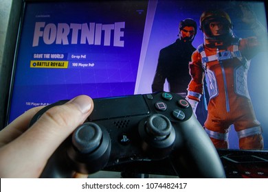 kaunas lithuania april 22 2017 playing fortnite game holding playstation controller - royalty free fortnite images