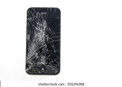 KAUNAS, LITHUANIA - DECEMBER, 26, 2015: Cracked screen smartphone. Broken iphone 4
