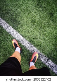 KAUNAS, LITHUANIA - Jul 09, 2020: A Vertical Top View Of A Soccer Player's Feet While Standing In The Artificial Soccer Pitch, In Kaunas, Lithuania