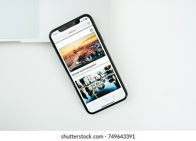 KAUNAS, LITHUANIA - NOVEMBER 05, 2017: New Apple Iphone X Flagship Smartphone Placed On White Table. Latest Apple Iphone 10 Mobile Phone Model