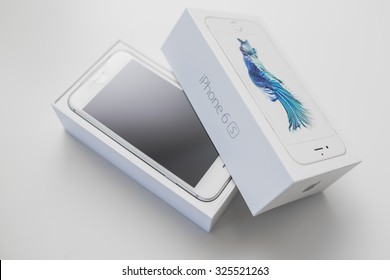 KAUNAS, LITHUANIA - OCTOBER 09, 2015: Unboxing new Apple iPhone 6S. Isolated on white.