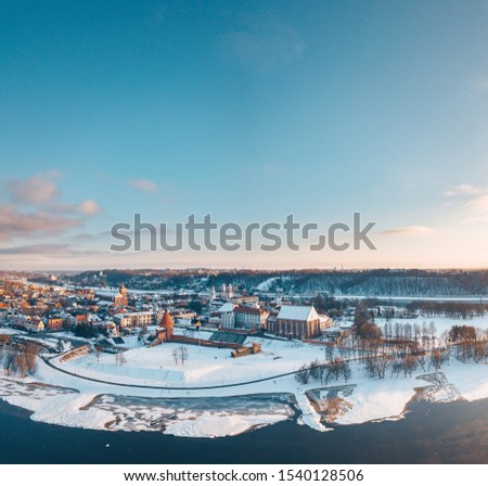 Kaunas old town in the winter evening. Drone aerial view.