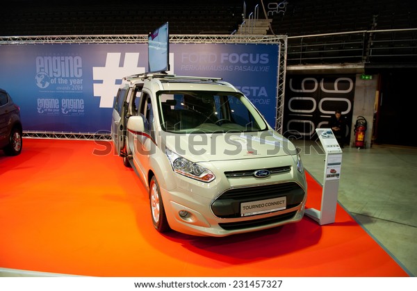 KAUNAS-SEP 19: Ford Tourneo Connect van on\
display on Sep. 19, 2014 in Kaunas, Lithuania. The all-new Ford\
Tourneo Connect is essentially a hard-working Transit Connect van\
with rear seats and\
windows