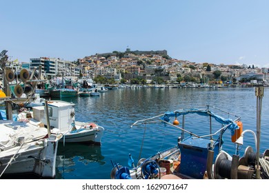 KAVALA, GREECE - JUNE 22, 2019:  Panorama from embankment to old town of city of Kavala, East Macedonia and Thrace, Greece