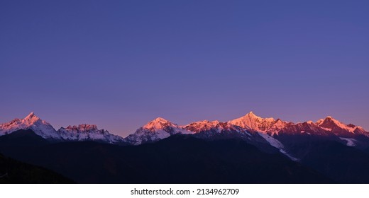 kawabego peak of the meili snow mountain at sunrise in yunnan province, china