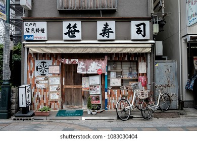 Kawagoe, Saitama, Japan - Circa 2018 : A view of mini old traditional restaurant and bicycles in front of noodle and rice shop.