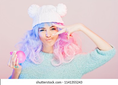 Kawaii Fashion Young Woman With Pink And Purple Hair, Posing, Swearing Pastel Colors. Studio Lighting, Medium Retouch.