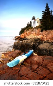 Kayak In Acadia National Park In Maine Next To A Lighthouse