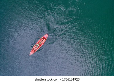 Kayak Floats On The River Aerial View, Top View From A Drone, Two Guys In A Canoe