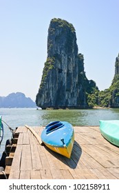 Kayak With Limestone Mountains Background At Halong Bay, Vietnam