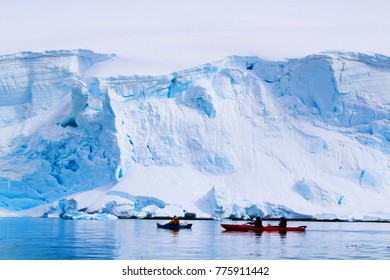 Kayak Near Glacier In Antarctica