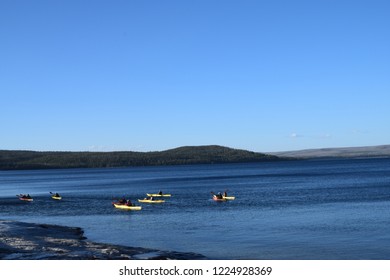 Kayak Riders Near The Trail Of West Thumb Geyser Basin, By West Thumb In The Yellowstone Lake, Near The Exit To The Grand Teton National Park, In Yellowstone National Park, USA