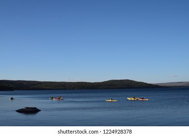 Kayak Riders Near The Trail Of West Thumb Geyser Basin, By West Thumb In The Yellowstone Lake, Near The Exit To The Grand Teton National Park, In Yellowstone National Park, USA