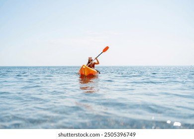 Kayak sea woman. Happy attractive woman with long hair in red swimsuit, swimming on kayak. Summer holiday vacation and travel concept. - Powered by Shutterstock