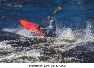 Kayak Slalom Canoe Race In White Water Rapid River, Process Of Kayaking Competition With Colorful Canoe Kayak Boat Paddling, Process Of Canoeing With Big Water Splash