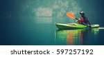 Kayak Water Sports Banner with Copy Space. Senior Kayaker on the Scenic Lake Panoramic Photo.