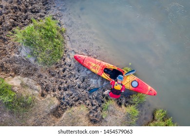 Kayaker On A Muddy Shore Of Dismal River In Nebraska - Overhead Aerial View