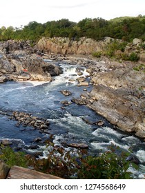 Kayakers On The Potomac River At Great Falls Waterfalls In Montgomery County, Maryland, USA