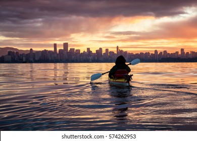 Kayaking Around Vancouver Downtown, BC, Canada, During A Beautiful Winter Sunrise.