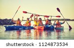 Kayaking and canoeing with family. Children on canoe. Family on kayak ride.