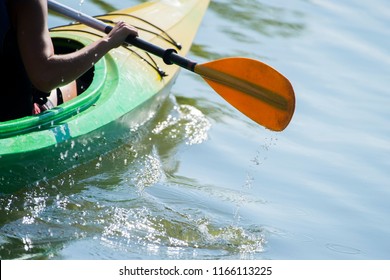 Kayaking. Close Up Of Man Holding Kayak Paddle 