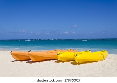 Kayaks On The Beautiful Sandy Caribbean Beach In Dominican Republic