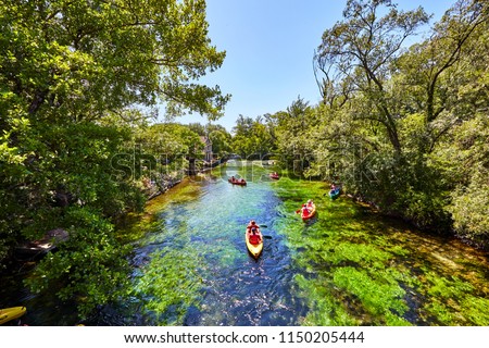 kayaks on  river Sorgue in Fontaine de Vaucluse. Vaucluse, Provence, France, Europe