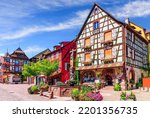 Kaysersberg Vignoble, France. Picturesque street with traditional half timbered houses on the Alsace Wine Route.