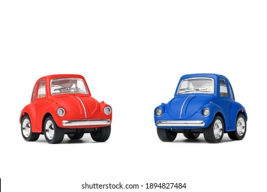 Kazakhstan, Almaty  - January 15, 2020: Two volkswagen beetle toys red and blue on white isolated background. Isolate. Editorial.